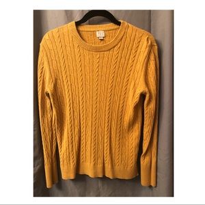 Yellow sweater with cable design